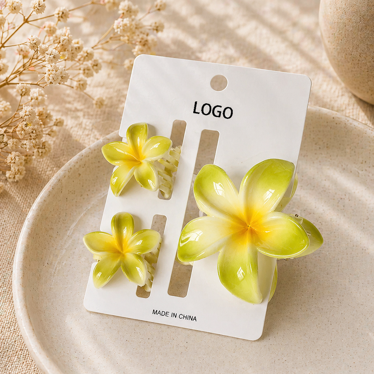 Plumeria Claw Clip Set — worn in a relaxed updo hairstyle | Sujify